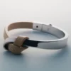 Bracelet Ormé Edition en argent rhodié avec cuir taupe
