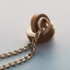 Collier Ormé, édition plaquée or avec cuir camel