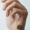 Collier Ormé, édition plaquée or avec cuir camel