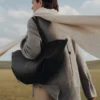 Édition Cyme : noir texturé avec surpiqûres écru