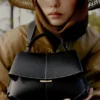 Mokki Mini Edition noir texturé avec surpiqûres écru
